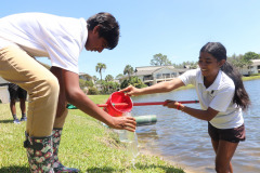 Gathering water samples for science